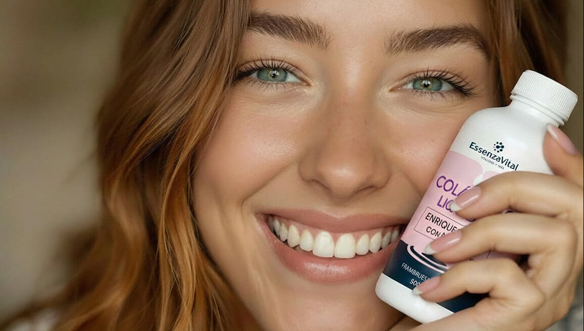 Woman holding a bottle of Essenc Vital product with a blurred background